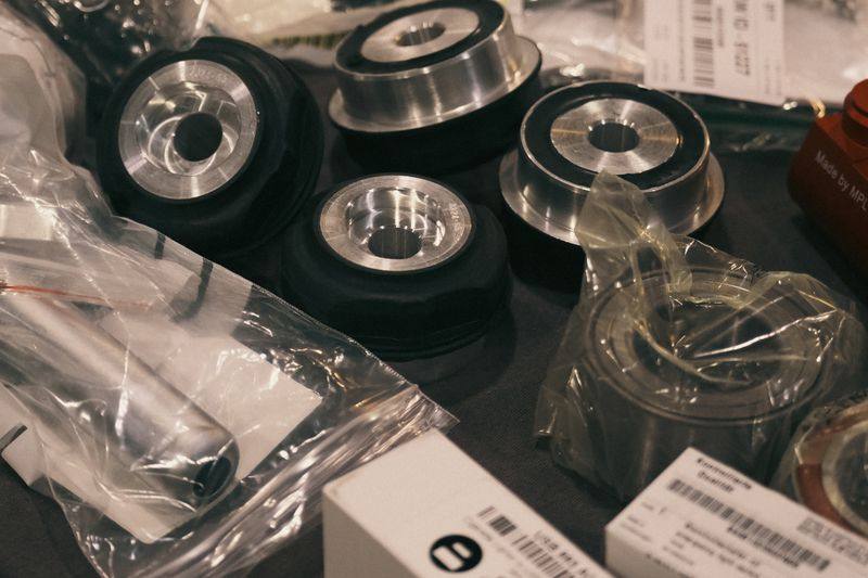 Bushes, mounts and boxed components laid out ready for fitting.